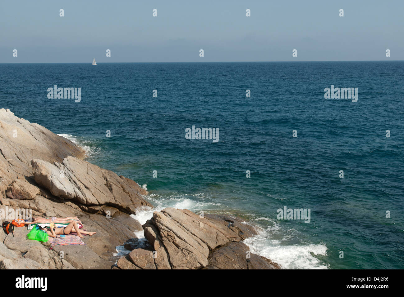 Seccheto, Italy, tourists bathe in the bay of Fetovaia Stock Photo