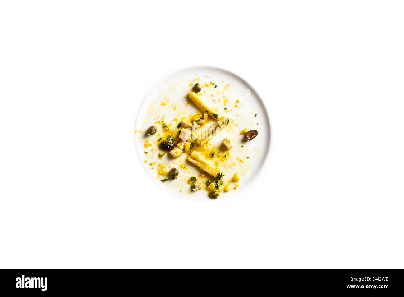 Homemade Maccheroni with Swordfish, capers, black olives and pinenuts. Stock Photo