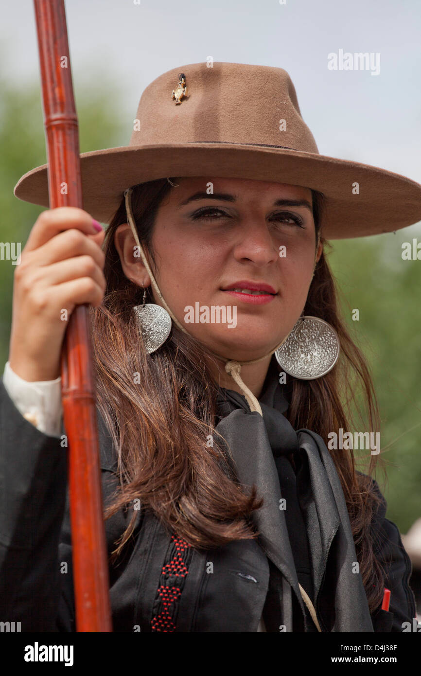 Woman gaucho on horses in traditional costumes in Salta, Argentina ...