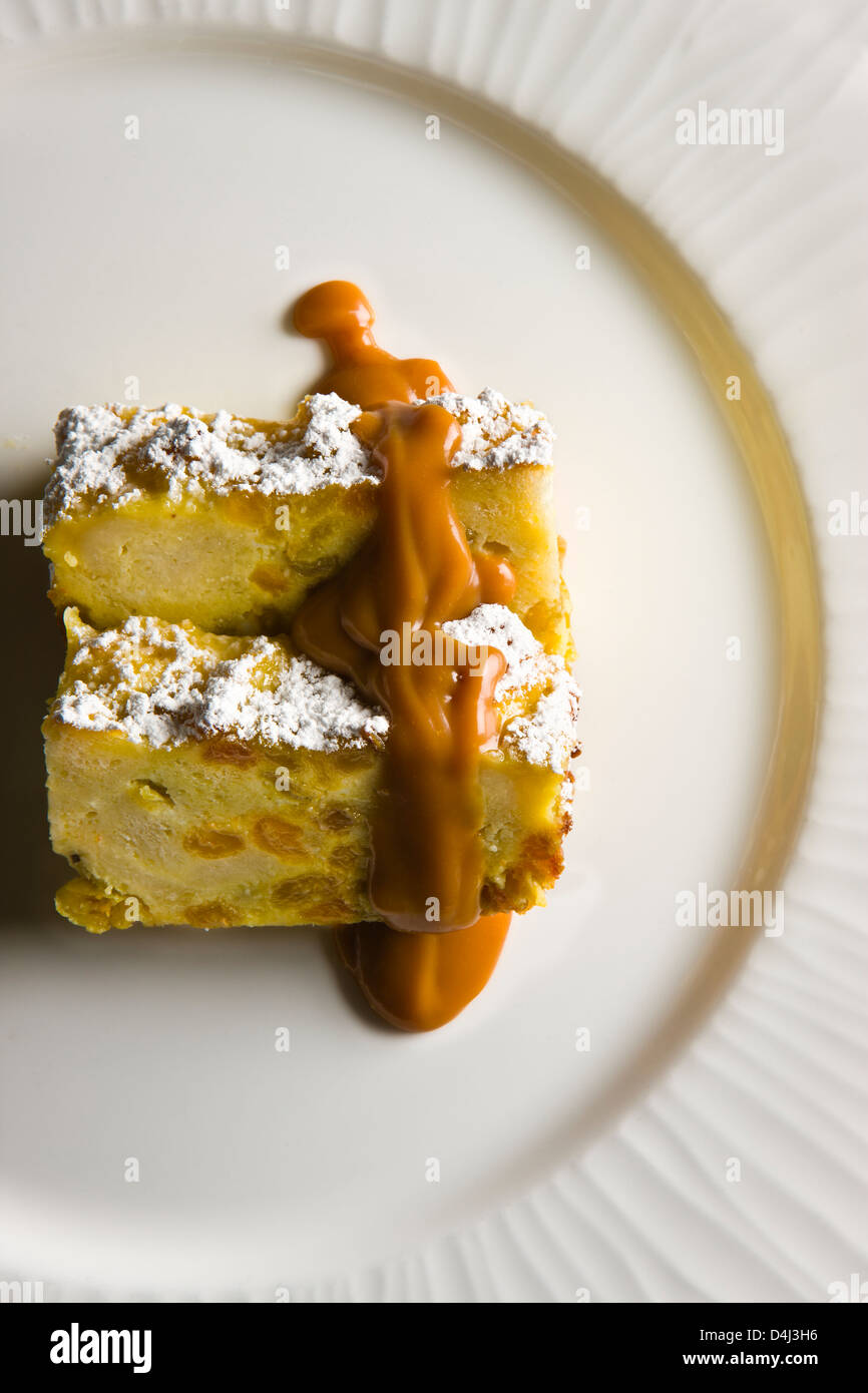Bread Pudding with Caramel prepared by Marcello Russodivito, Chef Owner of Marcello's Group. Stock Photo