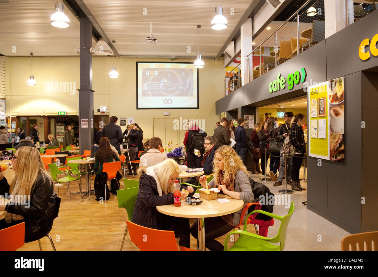 University students sitting eating food in a cafe, Edgbaston Campus, Birmingham University, UK Stock Photo