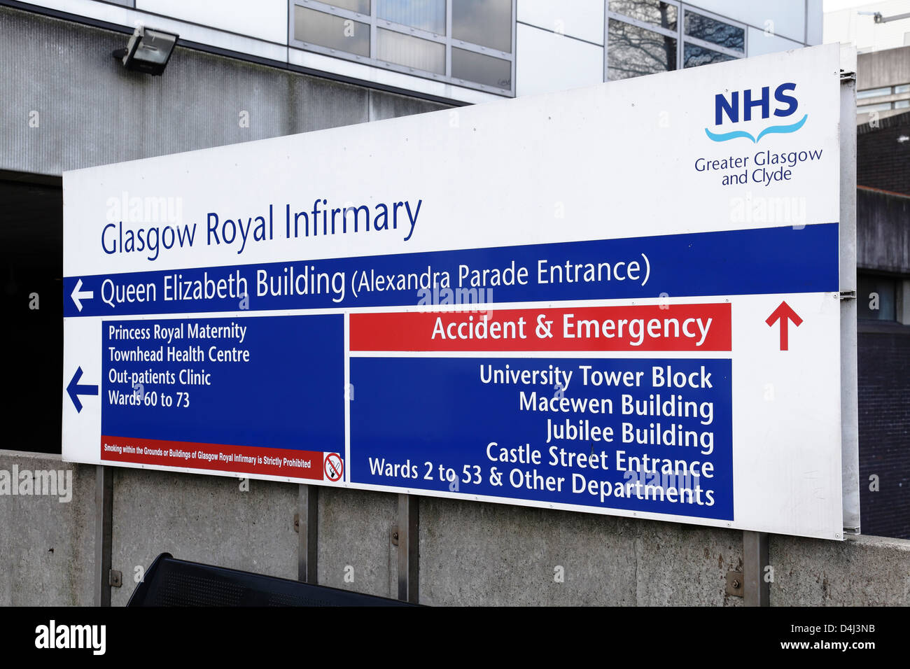 An Accident and Emergency and directions sign at the entrance to the Glasgow Royal Infirmary Queen Elizabeth Building, Alexandra Parade, Scotland, UK Stock Photo