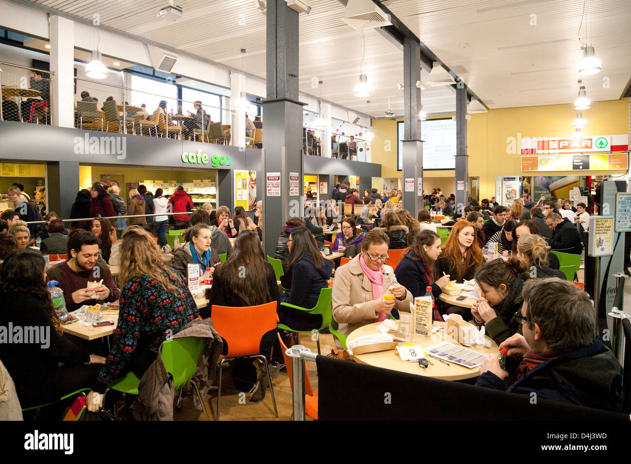 University students sitting eating food in a cafe, Edgbaston Campus, Birmingham University, UK Stock Photo
