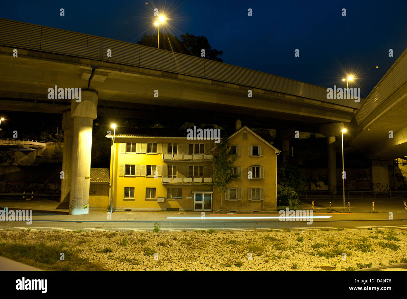 Zurich switzerland house under highway hires stock photography and