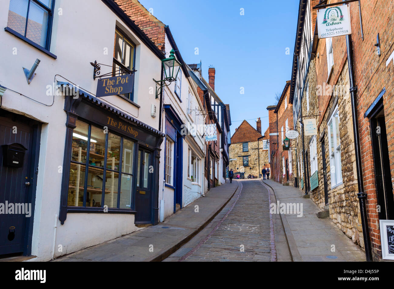 The famous Steep Hill in the historic old town, Lincoln, Lincolnshire, East Midlands, UK Stock Photo