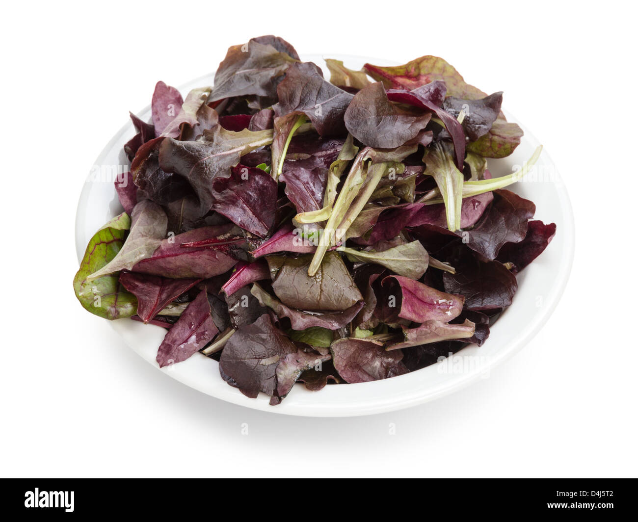 purple spinach leaves in bowl, isolated on white Stock Photo Alamy