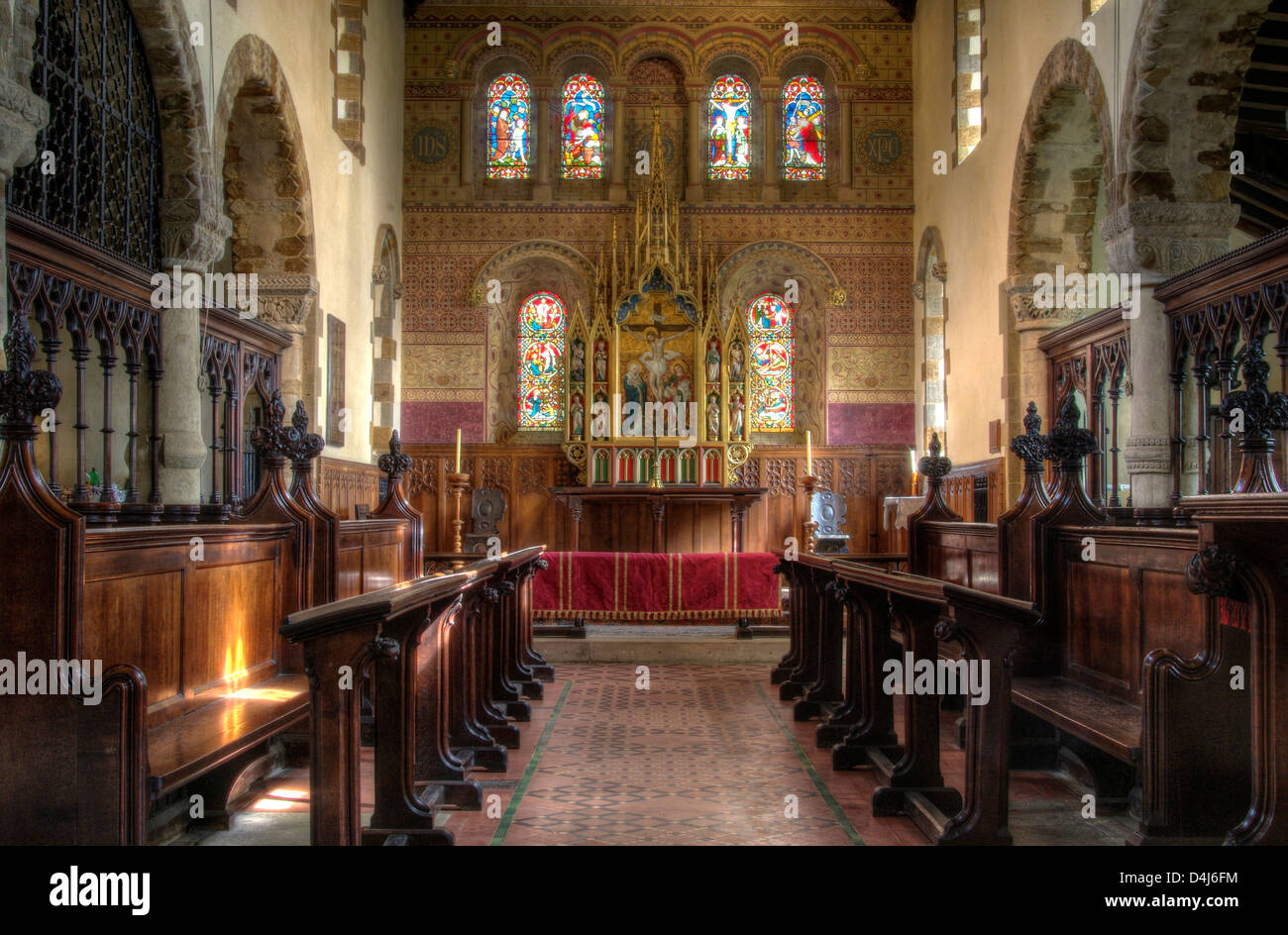 Interior of St Peters Church, Northampton, showing the restored Victorian decorations to the Chancel Stock Photo