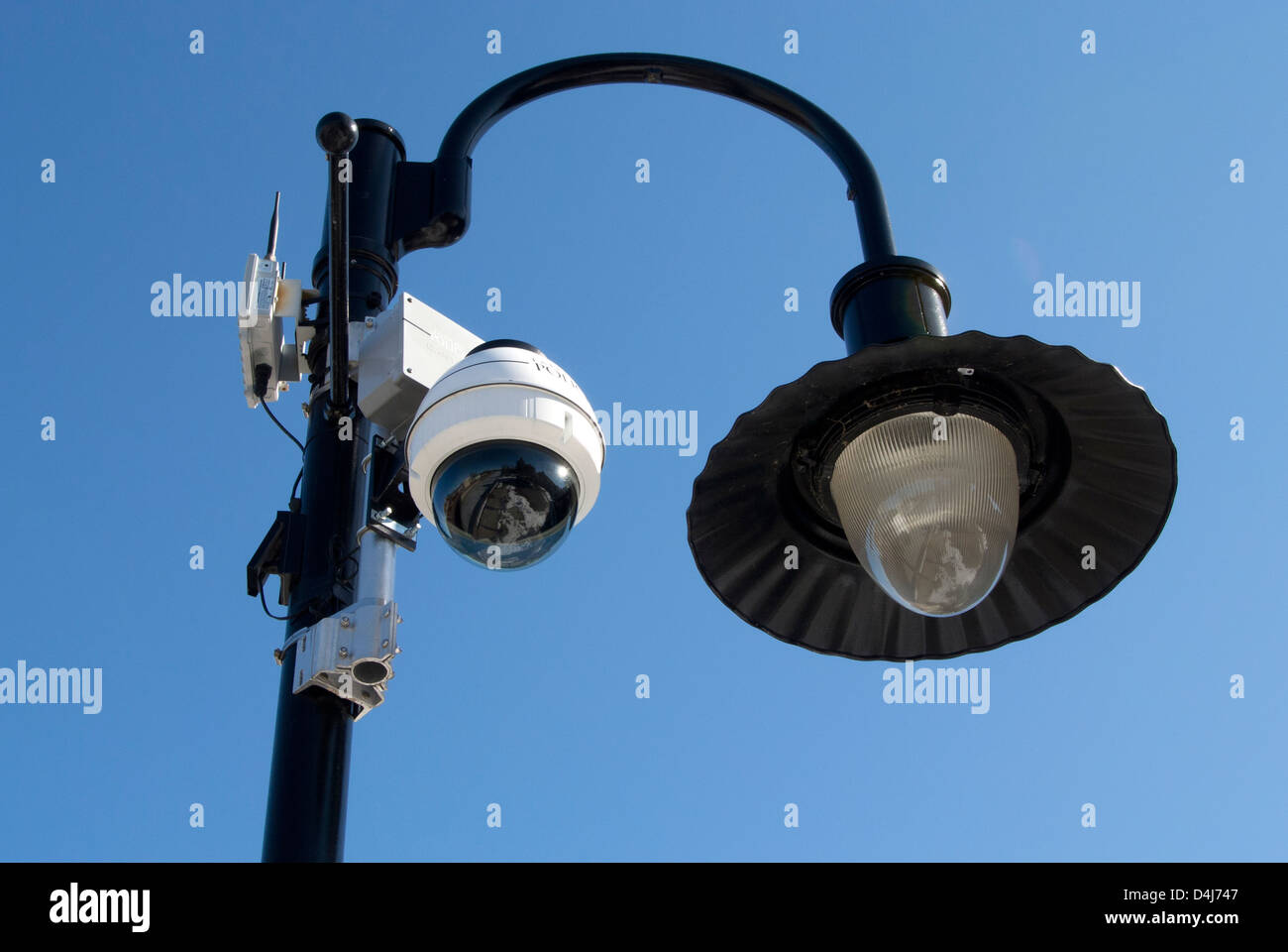 Surveillance camera on light pole. Stock Photo