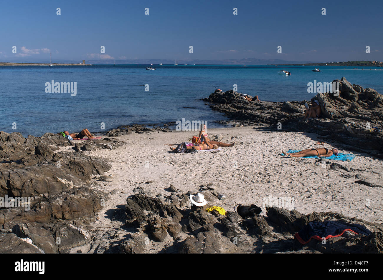 Stintino, Italy, bathers on the beach Stock Photo