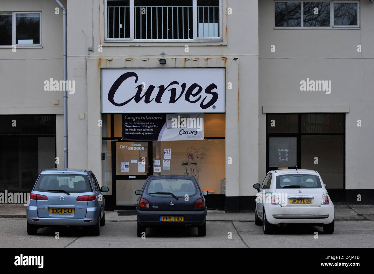 The entrance to Curves women's only gym on an industrial estate in Kenilworth, Warwickshire. Stock Photo