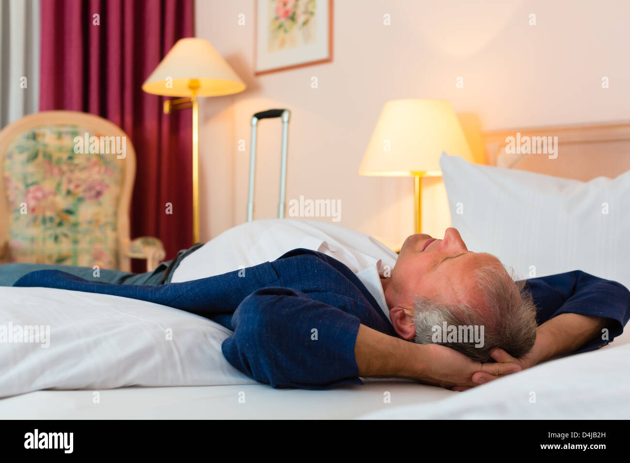 Elderly man lying in bed hi-res stock photography and images - Alamy