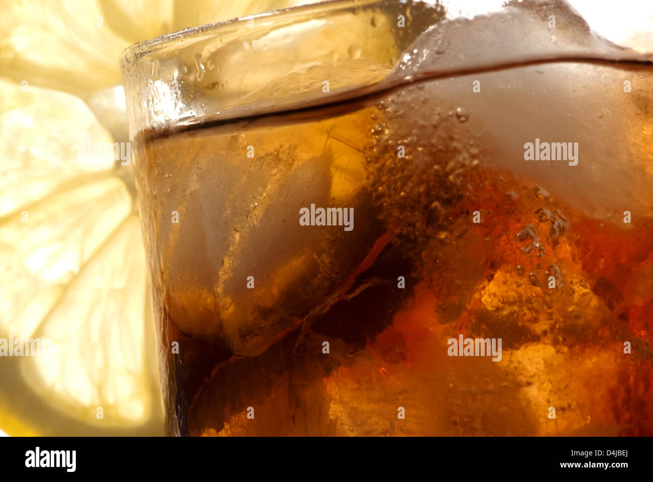 Glass with cola and ice Stock Photo