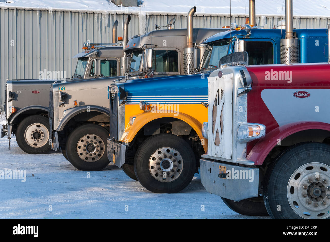Trucks parked outside the truck stop cafe, Dalton Highway, North Slope Haul Road, Coldfoot, Alaska. Stock Photo