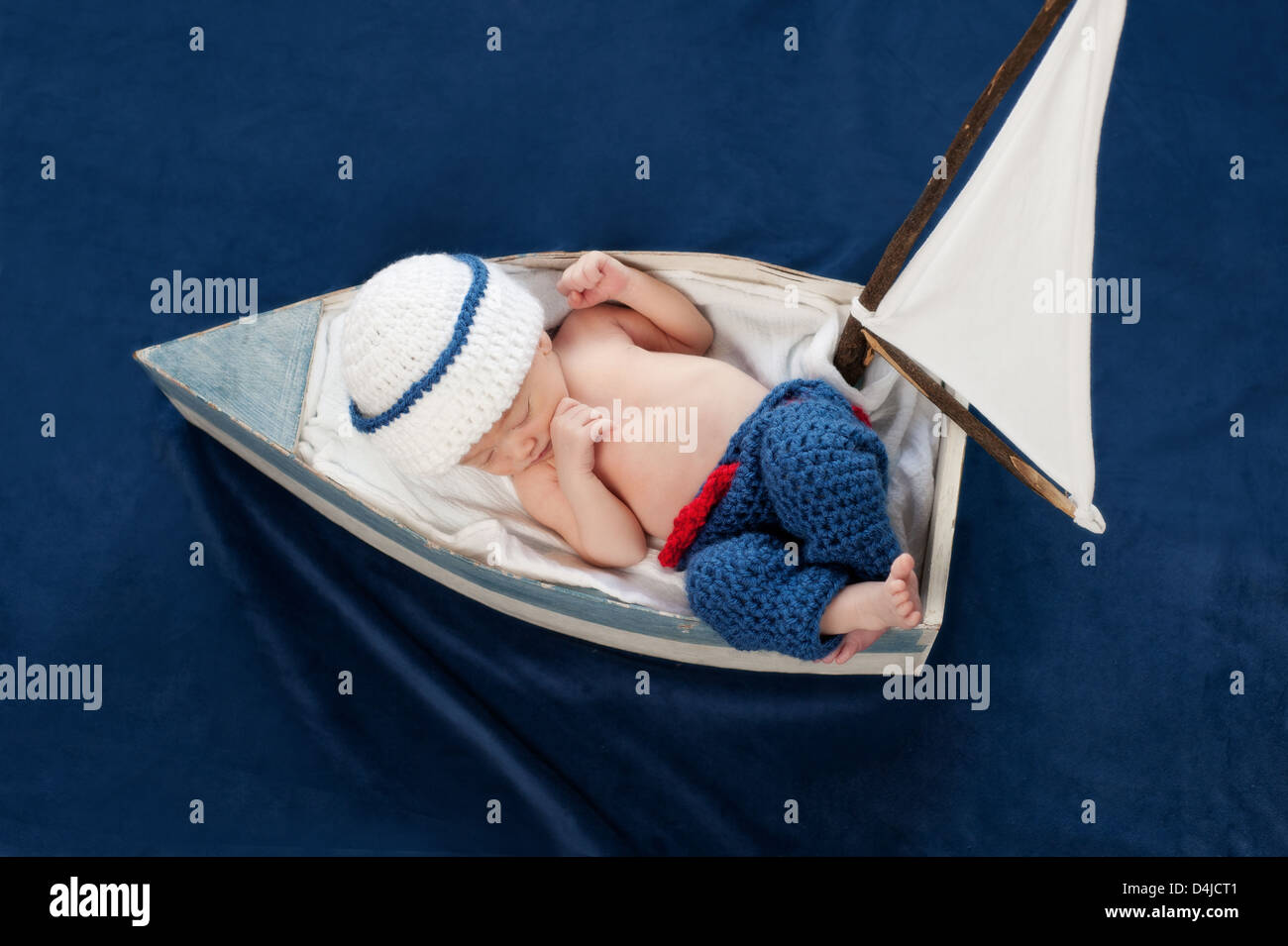 Newborn Baby Boy Sailor Sleeping in a Boat Stock Photo Alamy