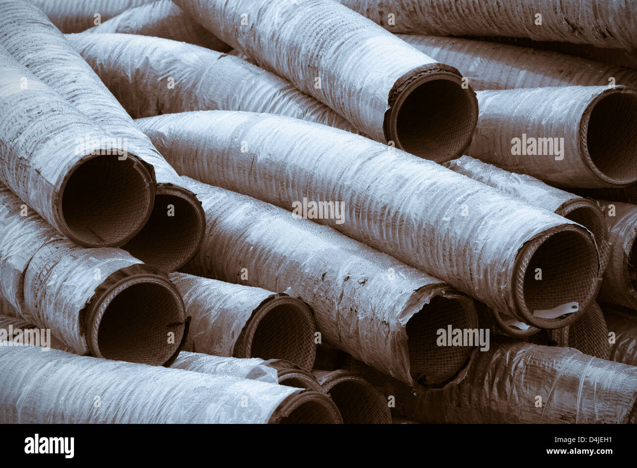 Flexible tubing stacked up outside Silver Bay Seafood processing plant