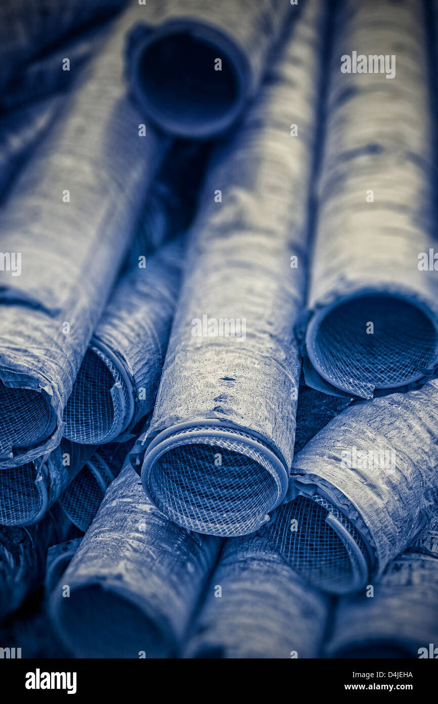 Flexible tubing stacked up outside Silver Bay Seafood processing plant