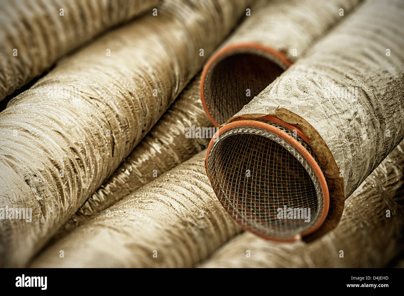 Flexible tubing stacked up outside Silver Bay Seafood processing plant