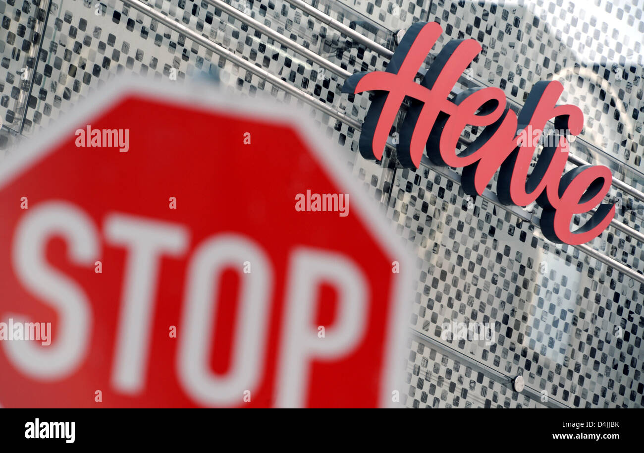 A stop sign pictured at a store of department store Hertie in Kassel, Germany, 12 Ferbuary 2009. The Kassel store is one of four closing today, the future of insolvent company Hertie and its 3,400 employees remains uncertain. Photo: UWE ZUCCHI Stock Photo