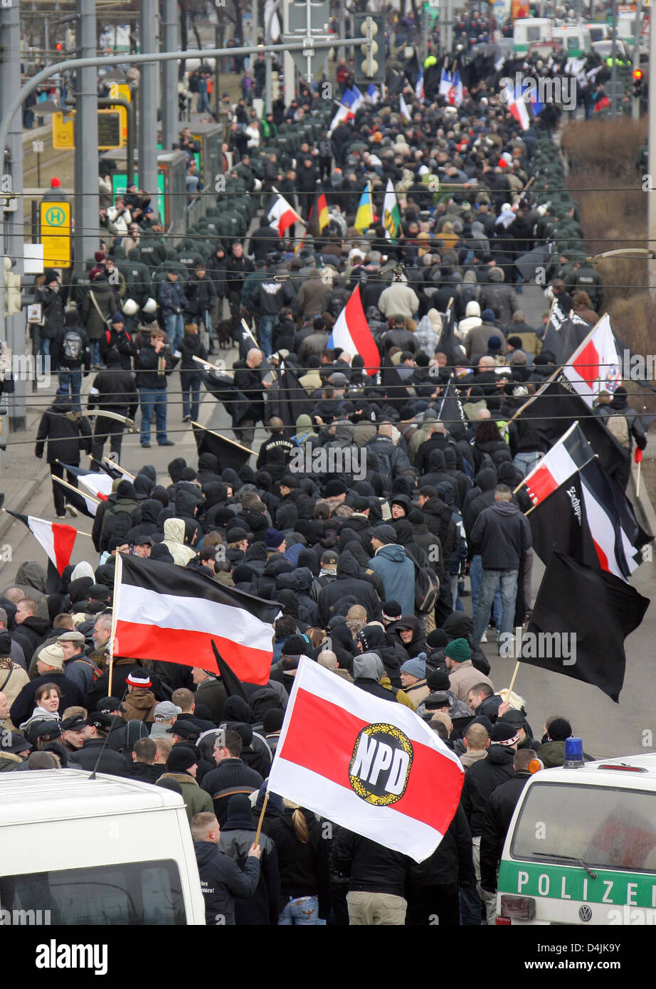 Rightist extremists march through Dresden, Germany, 14 February 2009. Far-right wing demonstrators traditionally provoke witha march  at the commemorations for the vicitims of the 1945 Dresden bombings. The date marks the 64th anniversary of the vast bombings on Dresden  conducted by allied forces to the end of World War II in 1945. Approximately 25,000 people died in the fires. Ph Stock Photo