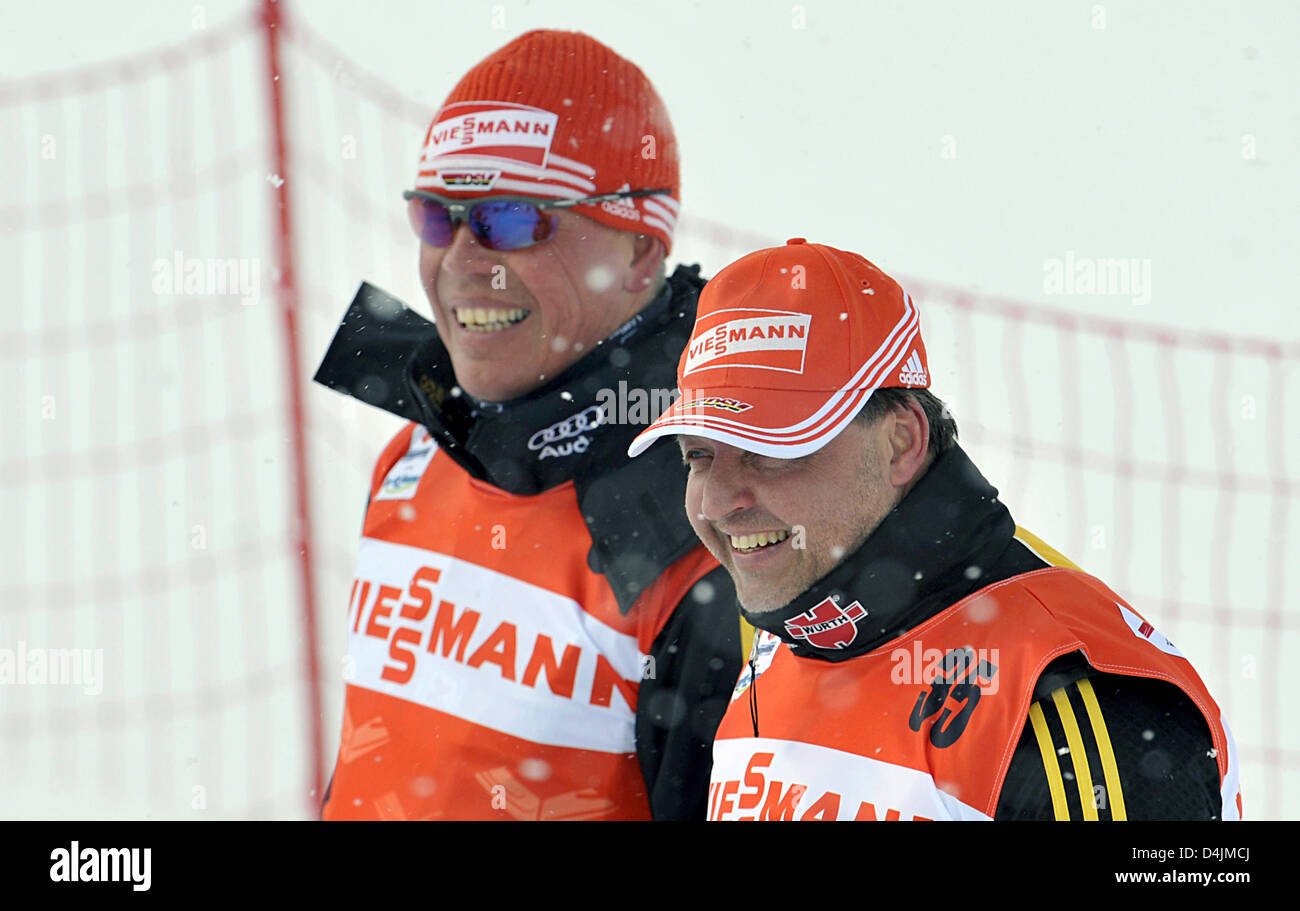 National coach of cross-country skiing Jochen Behle (R) and coach of German female cross-country skiers Ismo Haemaelaeinen seen during a training session for the Nordic Ski World Championships in Liberec, Czech Republic, 18 February 2009. Behle is worried about the women?s classic race of 10 kilometres. Photo: Gero Breloer Stock Photo