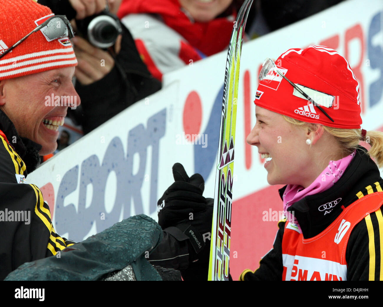 Ismo Haemaelaenen,  head coach for cross-country skiing, congratulates Miriam Goessner after the women?s cross-country skiing relay competition at the FIS Nordic World Ski Championships in Liberec, Czech Republic, 26 February 2009. Photo: Kay Nietfeld Stock Photo