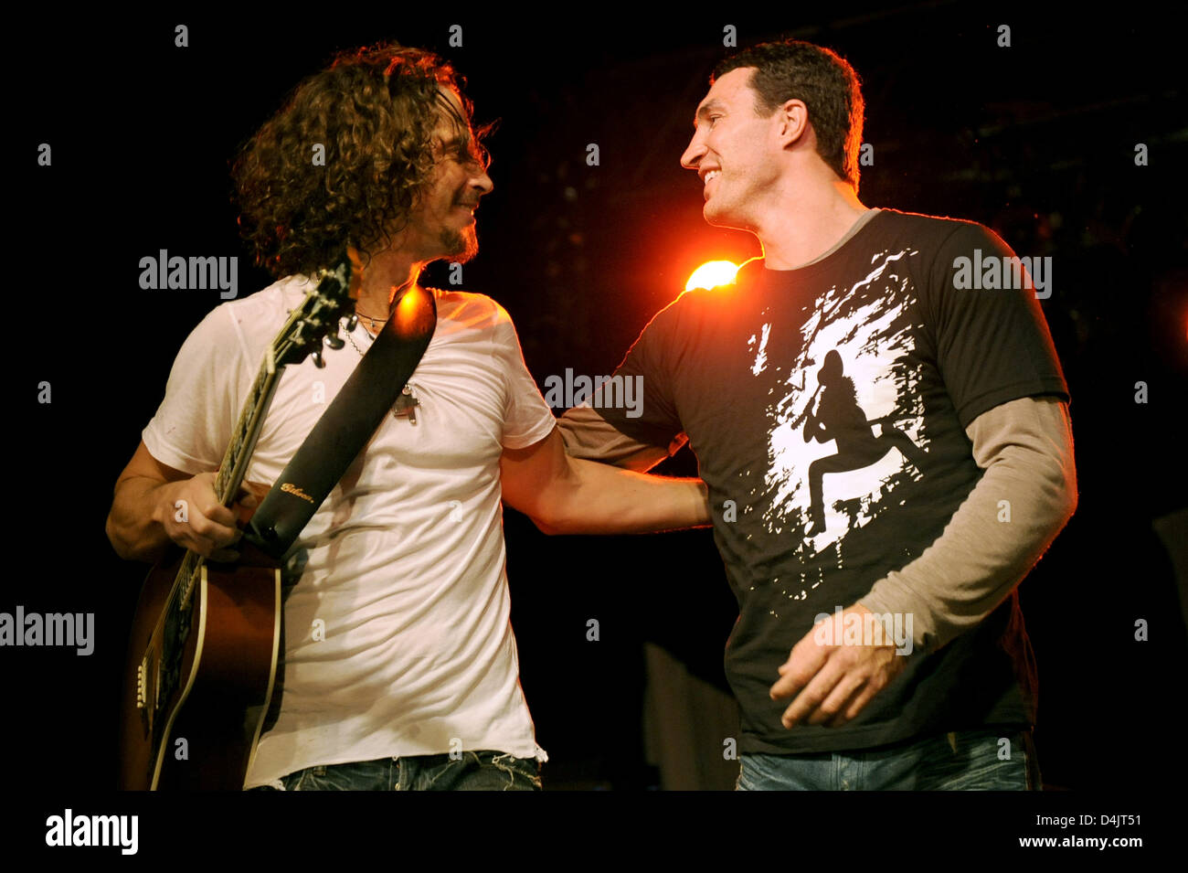 Boxer Vladimir Klitschko (R) and singer Chris Cornell seen together on stage at the ?Columbia Club? in Berlin, Germany, 27 February 2009. As singer and guitarist of several bands such as ?Soundgarden?, ?Audioslave? and ?Temple Of The Dog?, Cornell sold over 20 million albums worldwide and won several Grammy Awards. His new album ?Scream? will be released on 06 March 2009. Klitschko Stock Photo