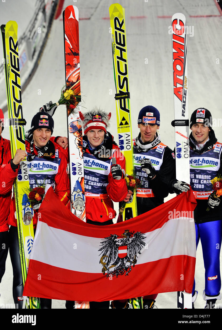 Austria?s ski jumpers Gregor Schlierenzauer (L-R), Thomas Morgenstern, Martin Koch and Wolfgang Loitzl jubilate after winning the team jumping competition at the FIS Nordic World Ski Championships in Liberec, Czech Republic, 28 February 2009. Photo: GERO BRELOER Stock Photo