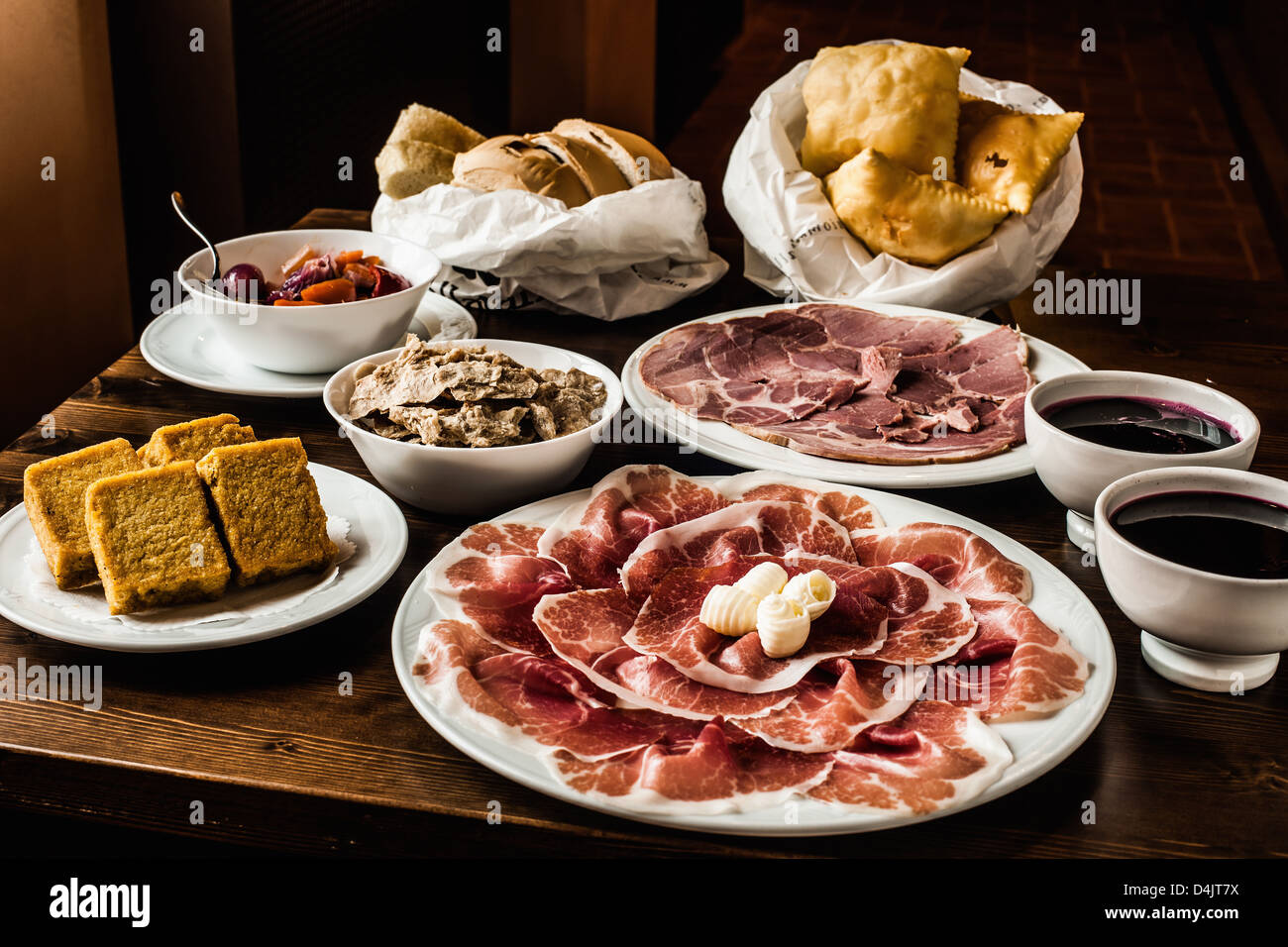 Meat, bread and fruit on table Stock Photo