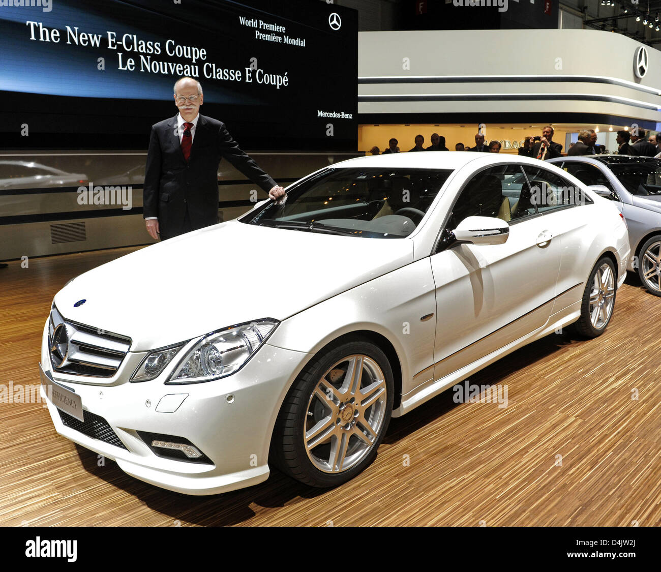 Daimler Ceo Dieter Zetsche Poses With A New Mercedes E350 Cgi Blueefficiency Coupe At The 79th Geneva Motor Show In Geneva Switzerland 03 March 2009 The Show Runs From 5 March To