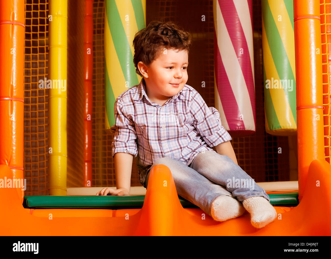Boy playing on playground hi-res stock photography and images - Alamy