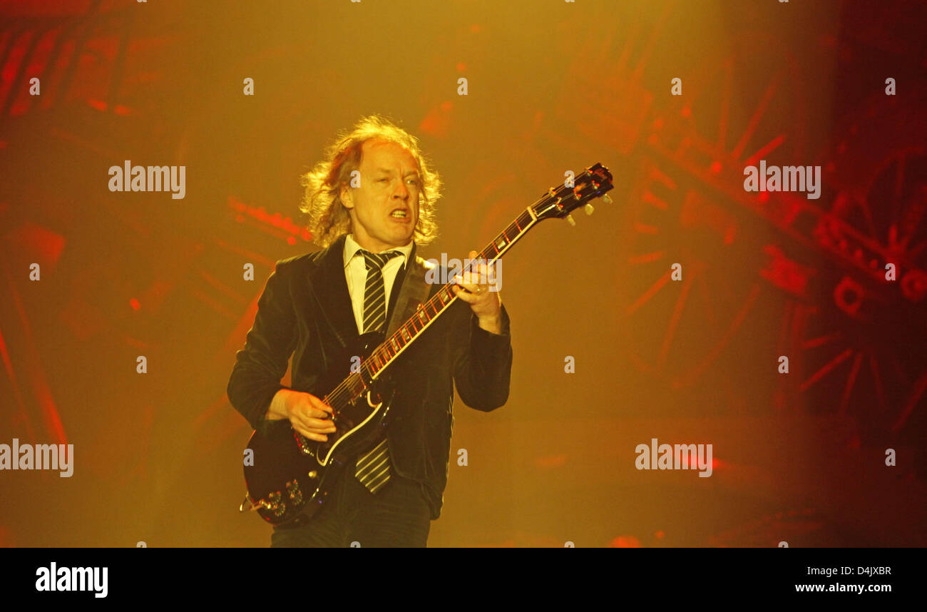 Guitarist Angus Young of the Australian band ?AC/DC? performs during the band?s first German concert in Leipzig, Germany, 05 March 2009. All concerts of the band?s German tour were sold out within minutes. Their first album in eight years ?Black Ice?, which was released in October 2008, stormed the top of the charts. The musicians, who can look back on 35 years of their band?s hist Stock Photo