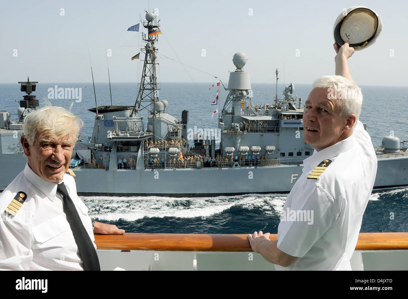 Traumschiff Cp Loveboat And Captain Of Ms Deutschland Andreas Junghblut R Pose On The Bridge Of Cruise Liner Ms Deutschland As German Navy Traumschiff Cp Loveboat And Captain Of Ms Deutschland Andreas Junghblut R Pose On The Bridge Of Cruise Liner Ms Deutschland As German Navy