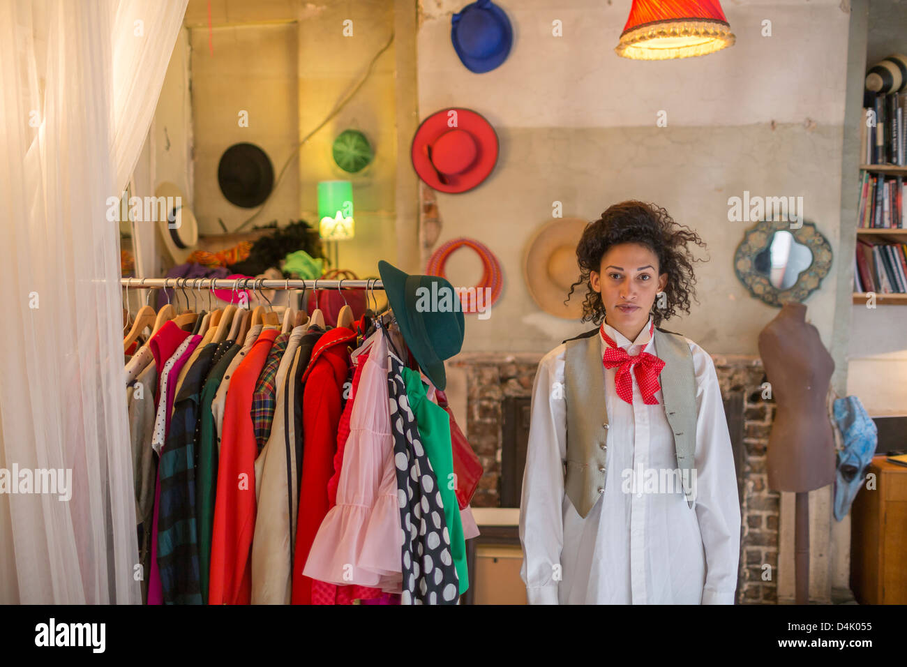 Woman standing in costume shop Stock Photo