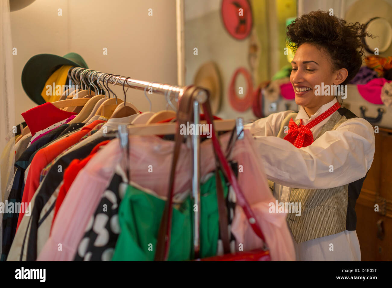 Woman shopping in clothes shop Stock Photo