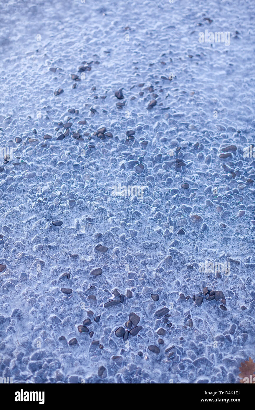 Holes in layer of ice Stock Photo Alamy