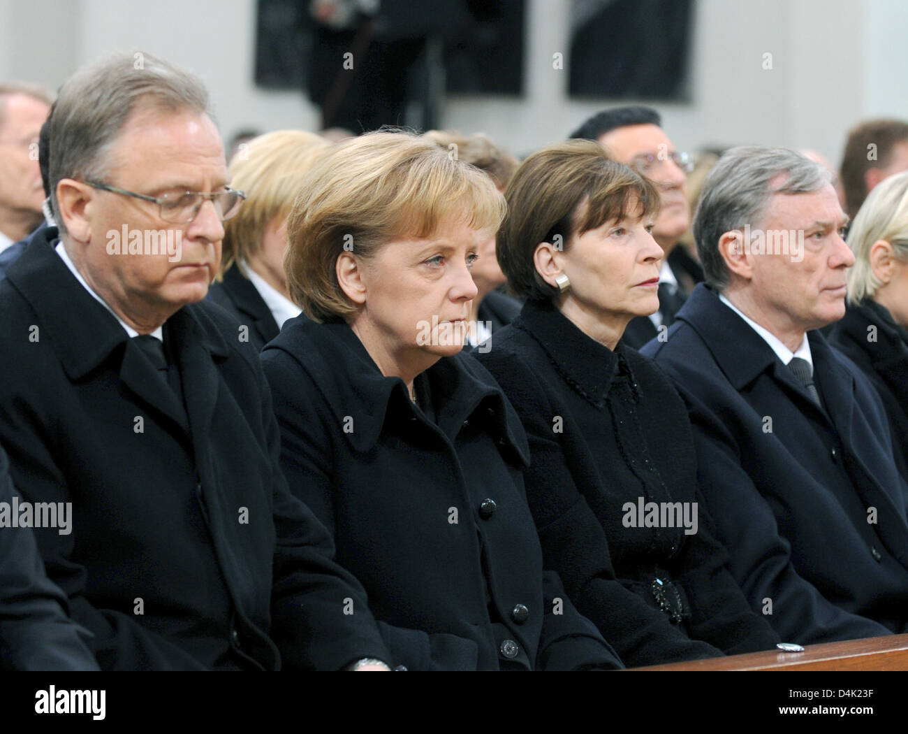 (R-L) German President Horst Koehler, his wife Frau Eva Luise, German Chancellor Angela Merkel and the President of the Federal Constitutional Court, Hans-Juergen Papier attend the official memorial service at St. Karl Borromaeus Church in Winnenden, Germany, 21 March 2009. Mourners commemorated the 15 vicitims killed during the rampage shooting at secondary school ?Albertville? in Stock Photo