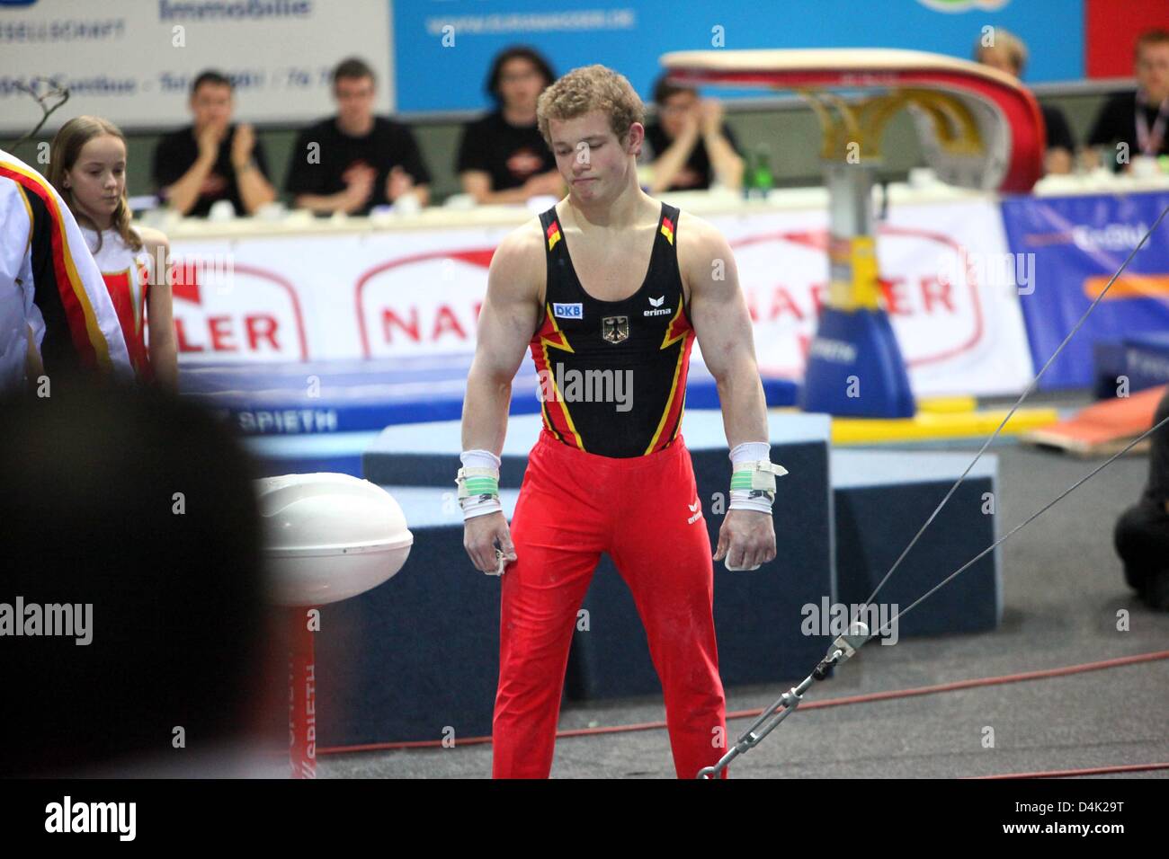 German gymnast Fabian Hambuechen falls off the horizontal bar and quits