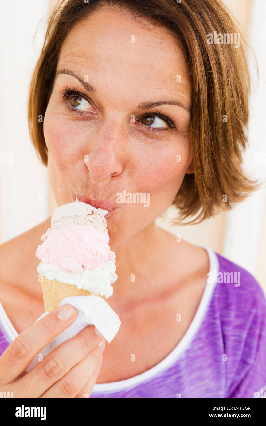 close-up-of-woman-eating-ice-cream-cone-stock-photo-alamy