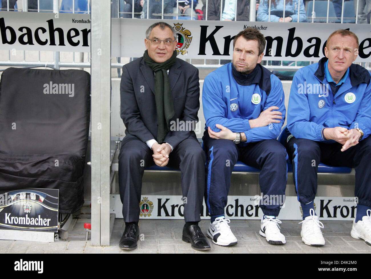 Wolfsburg S Head Coach Felix Magath L Sits Next To His Assistant Stock Photo Alamy