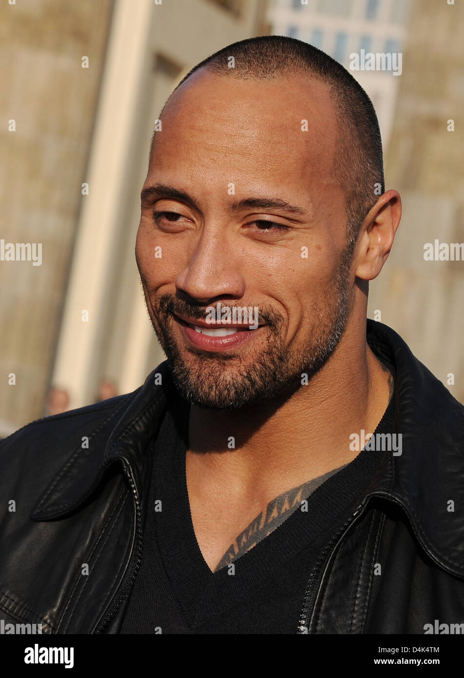US actor Dwayne Johnson portrayed during a photo call on the occasion of the upcoming Germany premiere of his movie ?Race to Witch Mountain? in front of Brandenburg Gate in Berlin, Germany, 31 March 2009. The film will be in German cinemas from 9 April 2009 on. Photo: Jens Kalaene Stock Photo