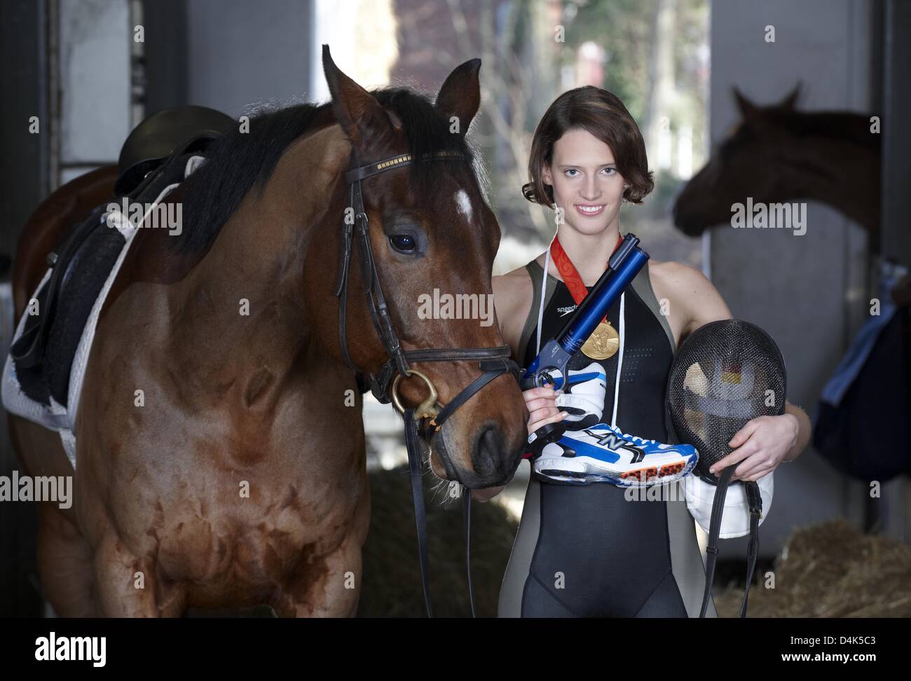 lena-schoeneborn-olympic-champion-in-modern-pentathlon-poses-with-her