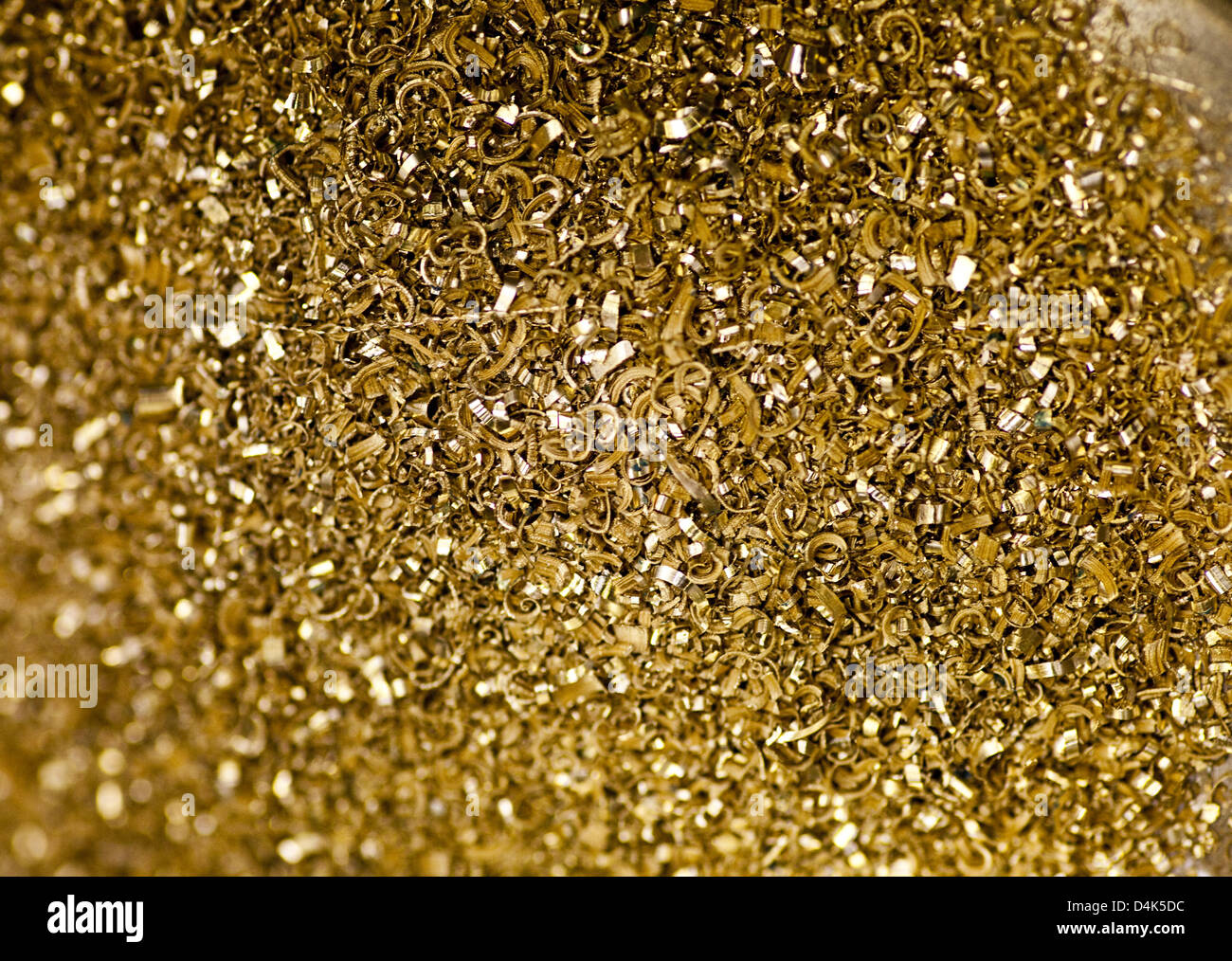 The picture shows gold granule that was melted from old gold at the Heraeus gold workmanship in Hanau, Germany, 26 March 2009. Gold granule can conveniently be manufactured into jewellery. Photo: Frank Rumpenhorst Stock Photo