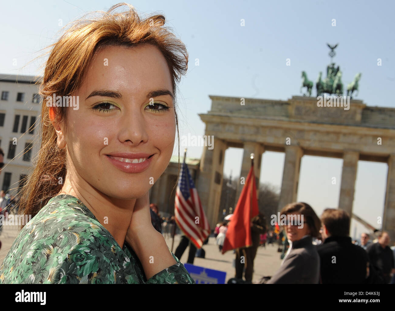 Croatian singer Nives Celsius, wife of German Bundesliga club SC Karlsruhe?s Dino Drpic, poses at Brandenburg Gate in Berlin, Germany, 03 April 2009. Celsius is featured on the cover of FHM Germany?s May 2009 issue. Photo: Jens Kalaene Stock Photo