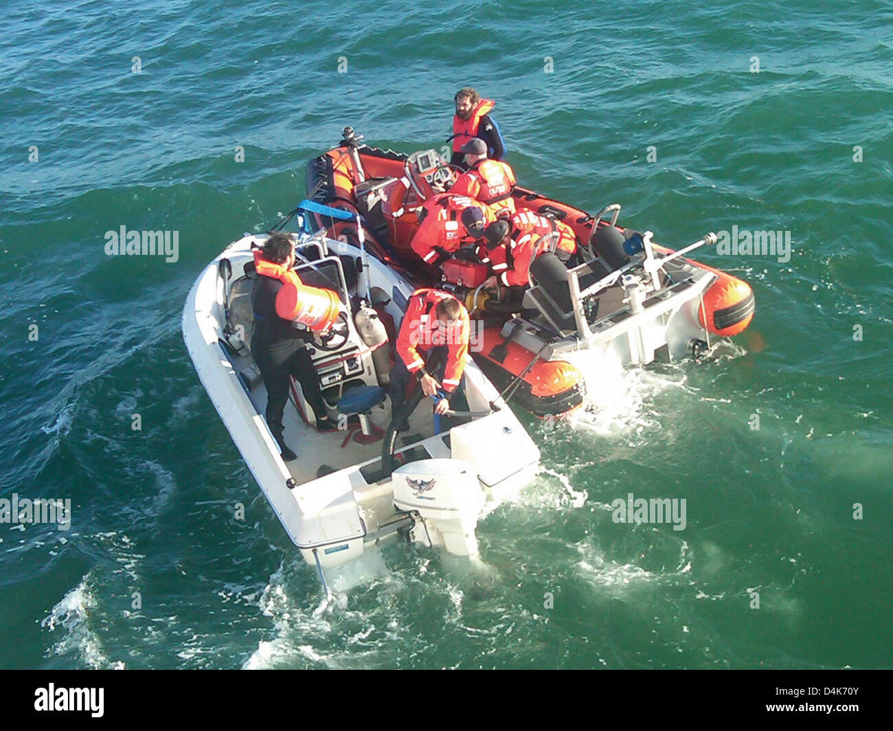 The U.S. Coast Guard successfully rescues two individuals from a ...
