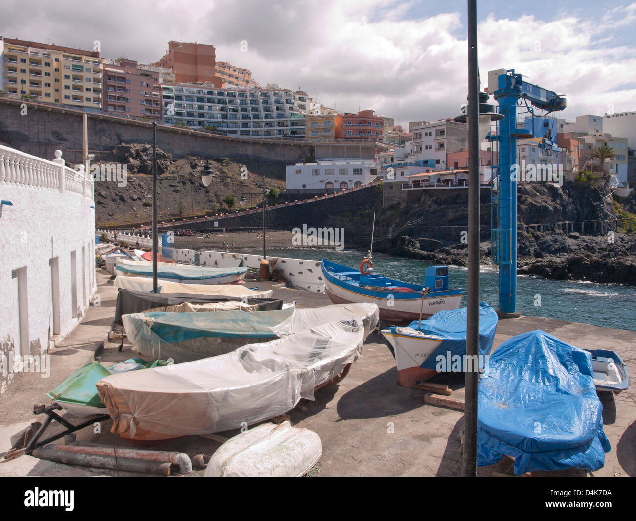 The town and fishing  harbour of Puerto Santiago on the west coast of Tenerife Spain, a thriving local community as well as a tourist resort Stock Photo