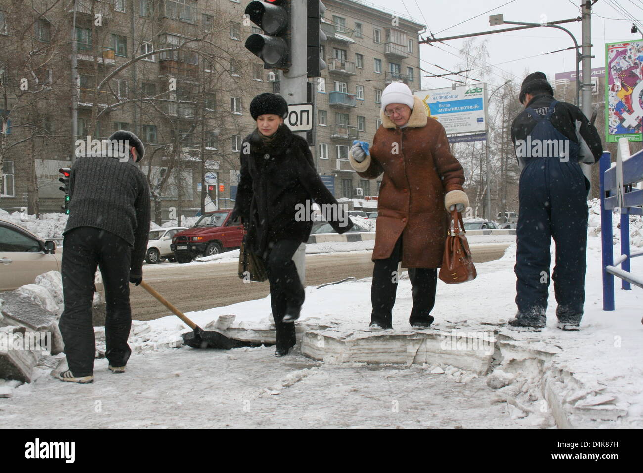 Pedestrians walk on ice in downtown Novosibirsk, Russia, 13 March 2009