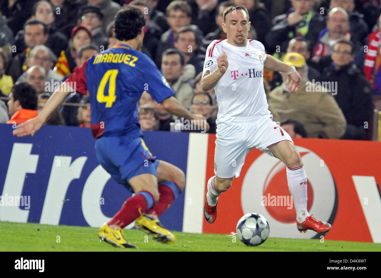 Bayern Munich?s Franck Ribery and Barcelona?s Rafael Marquez (L) vie for the ball during the Champions League quarter finals first leg match Barcelona vs Bayern Munich at Camp Nou stadium in Barcelona, Spain, 08 April 2009. Barcelona defeated Bayern Munich 4-0. The second leg match will take place in Munich on 14 April 2009. Photo: Andreas Gebert Stock Photo