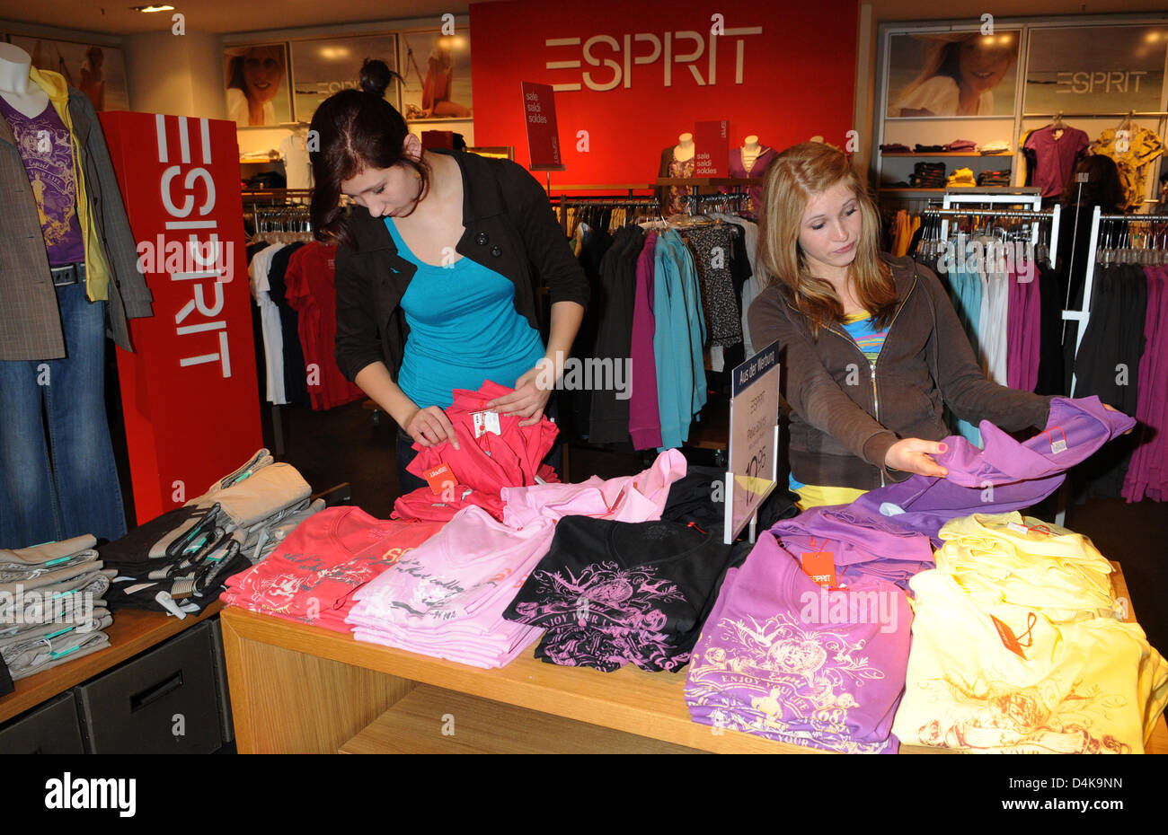 Two 14 year-old girls shop for clothes at a Kardstadt store in Munich ...