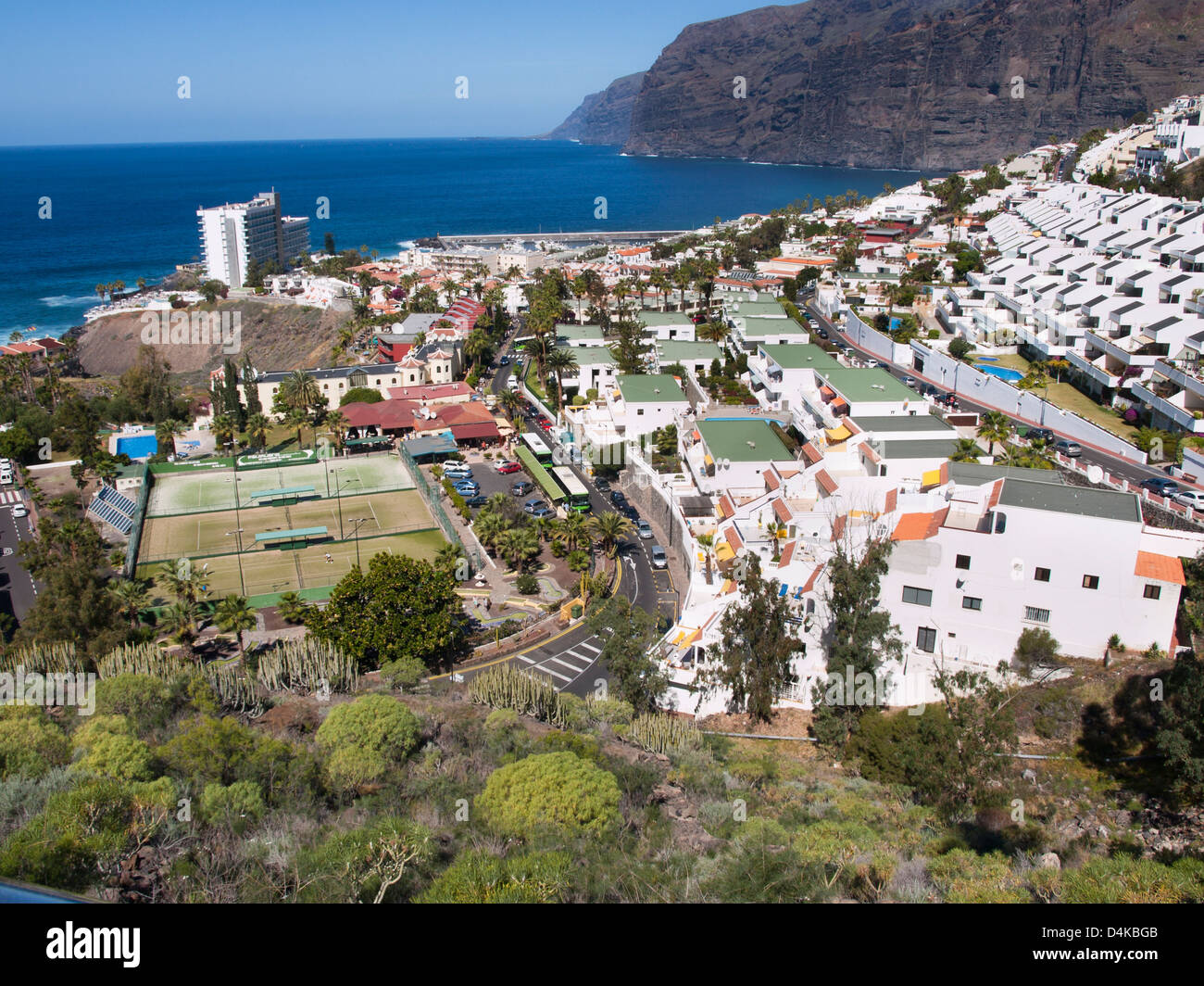 Los Gigantes holiday resort  in Tenerife Spain with the cliffs Acantilados and Atlantic ocean, bus station in the middle Stock Photo