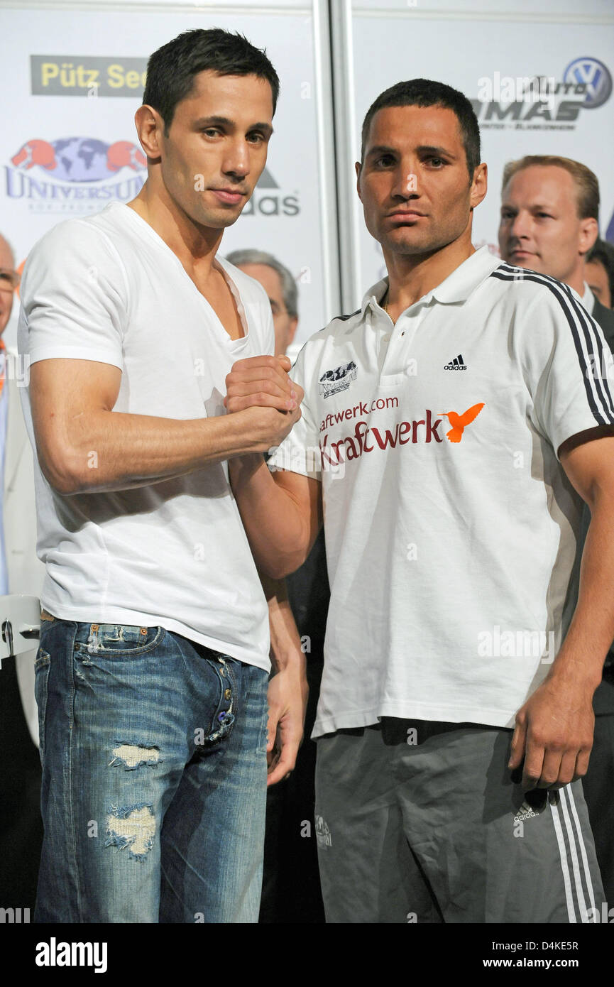 German WBA middleweight Champion Felix Sturm (L) and his Armenian contendor Khoren Gevor (R) pose during the official weighing in Nuerburg, Germany, 10 July 2009. Reigning European champion Gevor challenges Sturm for the title on 11 July. Photo: PETER STEFFEN Stock Photo